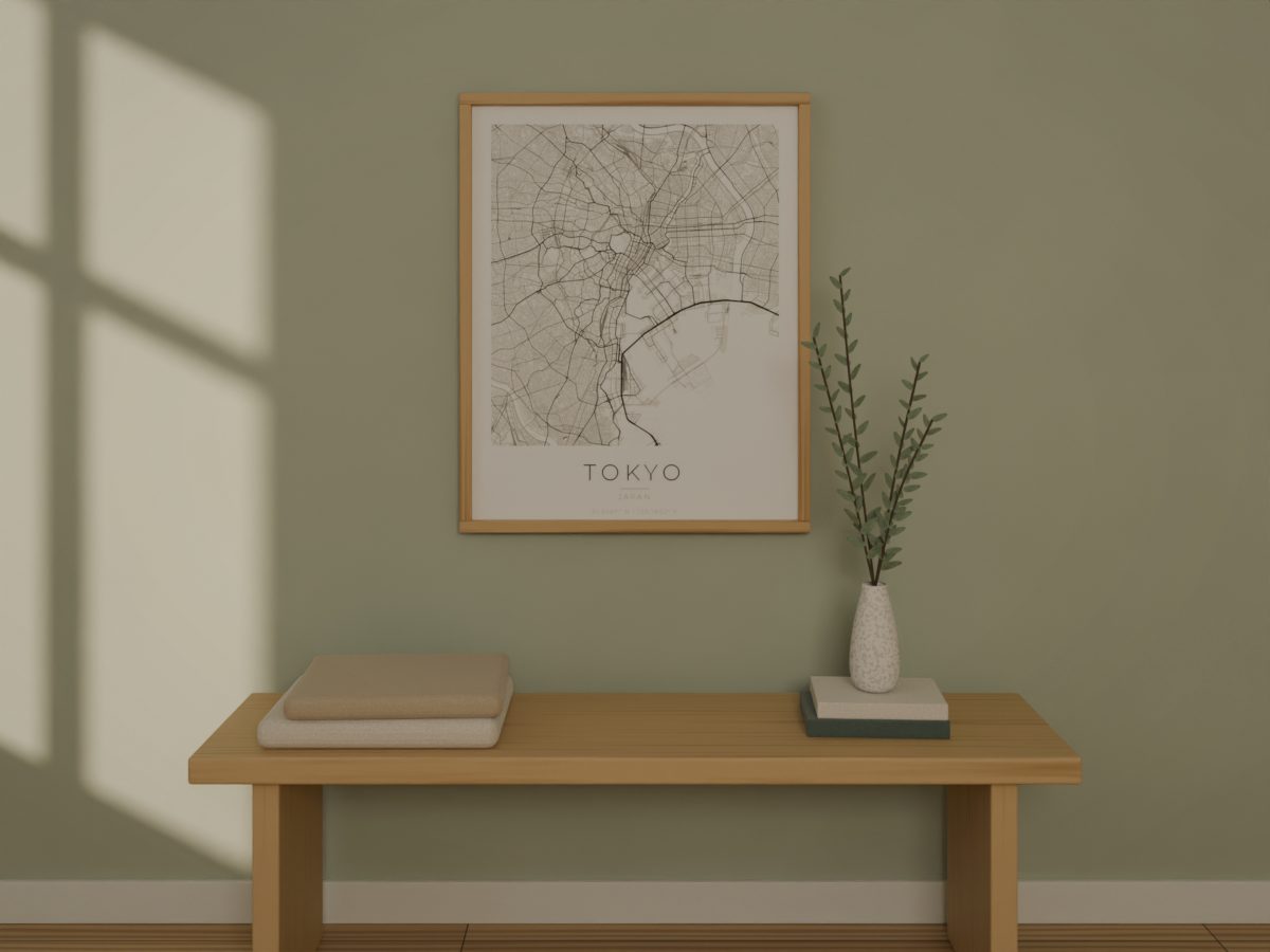 Tokyo city map poster in the Ink palette, framed in oak on a sage green wall