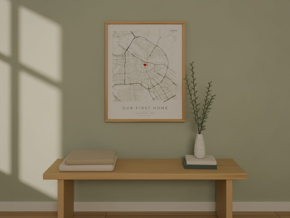 Example poster for housewarming, framed on a wall